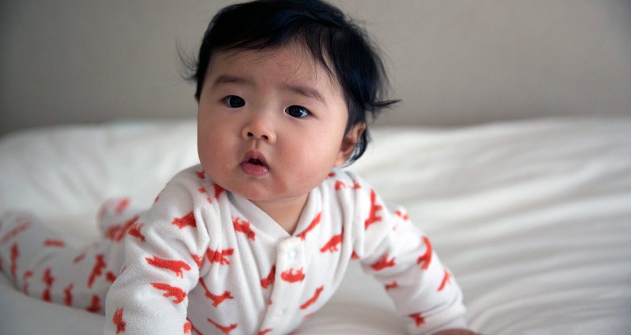 Not crawling just yet, but doing push-ups!