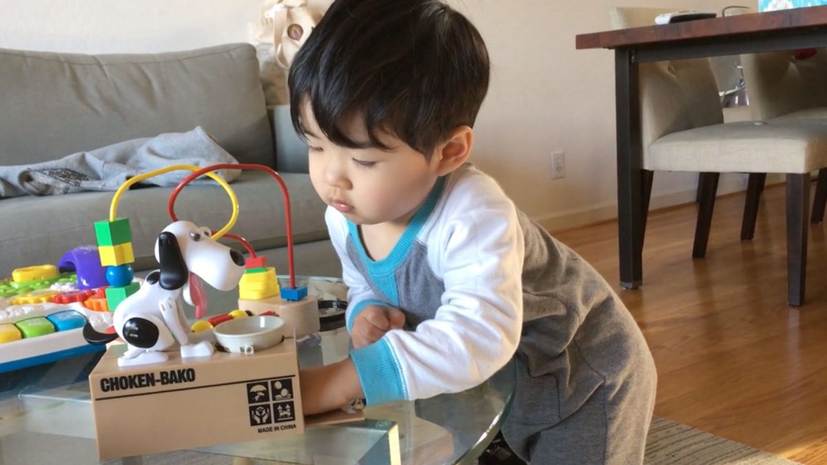 Daren enjoying his new piggy (doggy) bank!